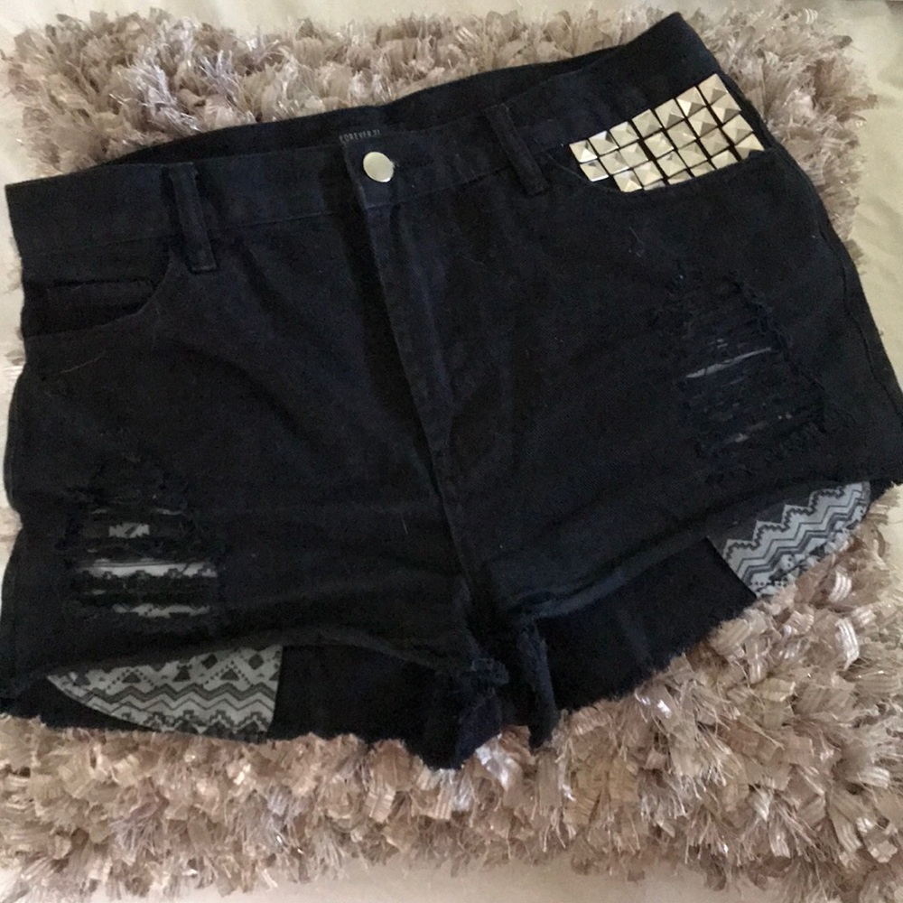 Black high waisted studded shorts